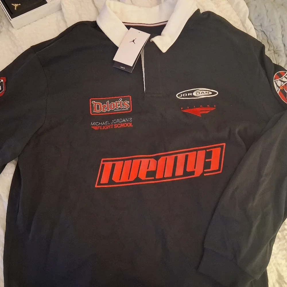 Air Jordan Rugby Black Long Sleeve Polo with White Collar and Red Logos